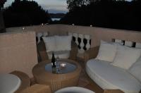 Ferienhaus Villa Calma in Costa de la Calma Mallorca, sehr sch�nes Reihenhaus mit 4 Schlafzimmern und herrlicher Poollagune, direkt am Meer und nur wenige Meter zum Sandstrand
